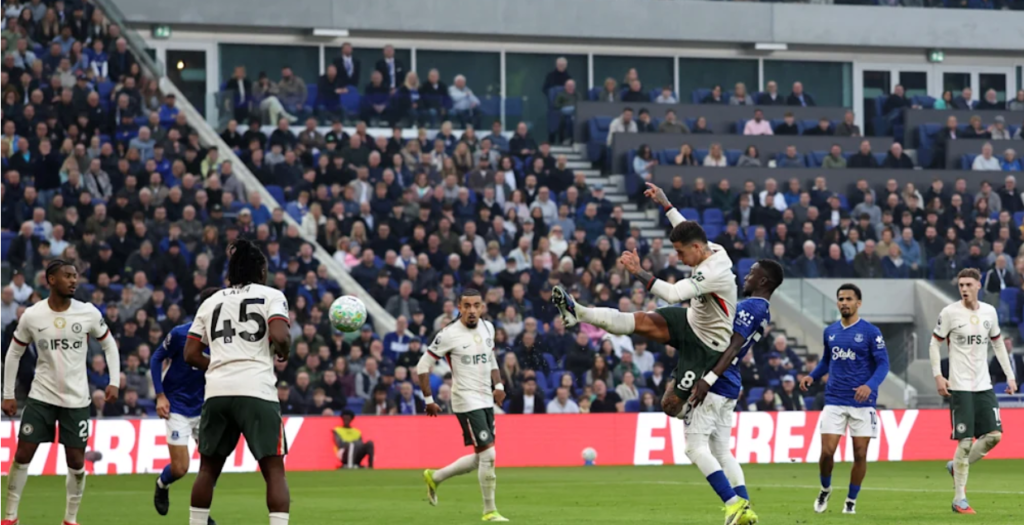 Everton vs Chelsea players battling during an intense Premier League match at Goodison Park
