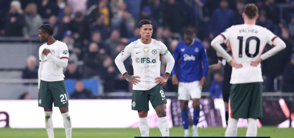 Everton vs Chelsea players battling during an intense Premier League match at Goodison Park